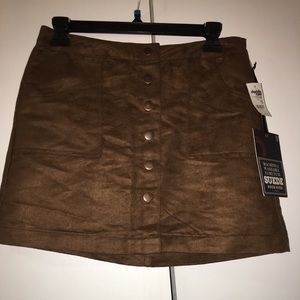 Machine washable suede mini button skirt